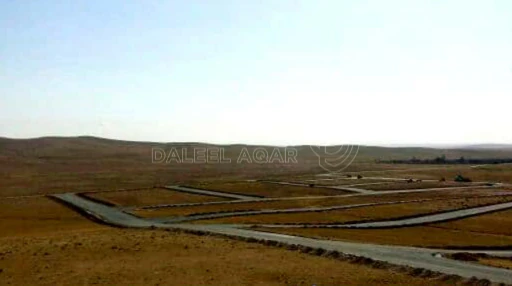 أرض في شمال شرق مطار الملكة علياء الدولي - 30,000 دأ - صورة 1